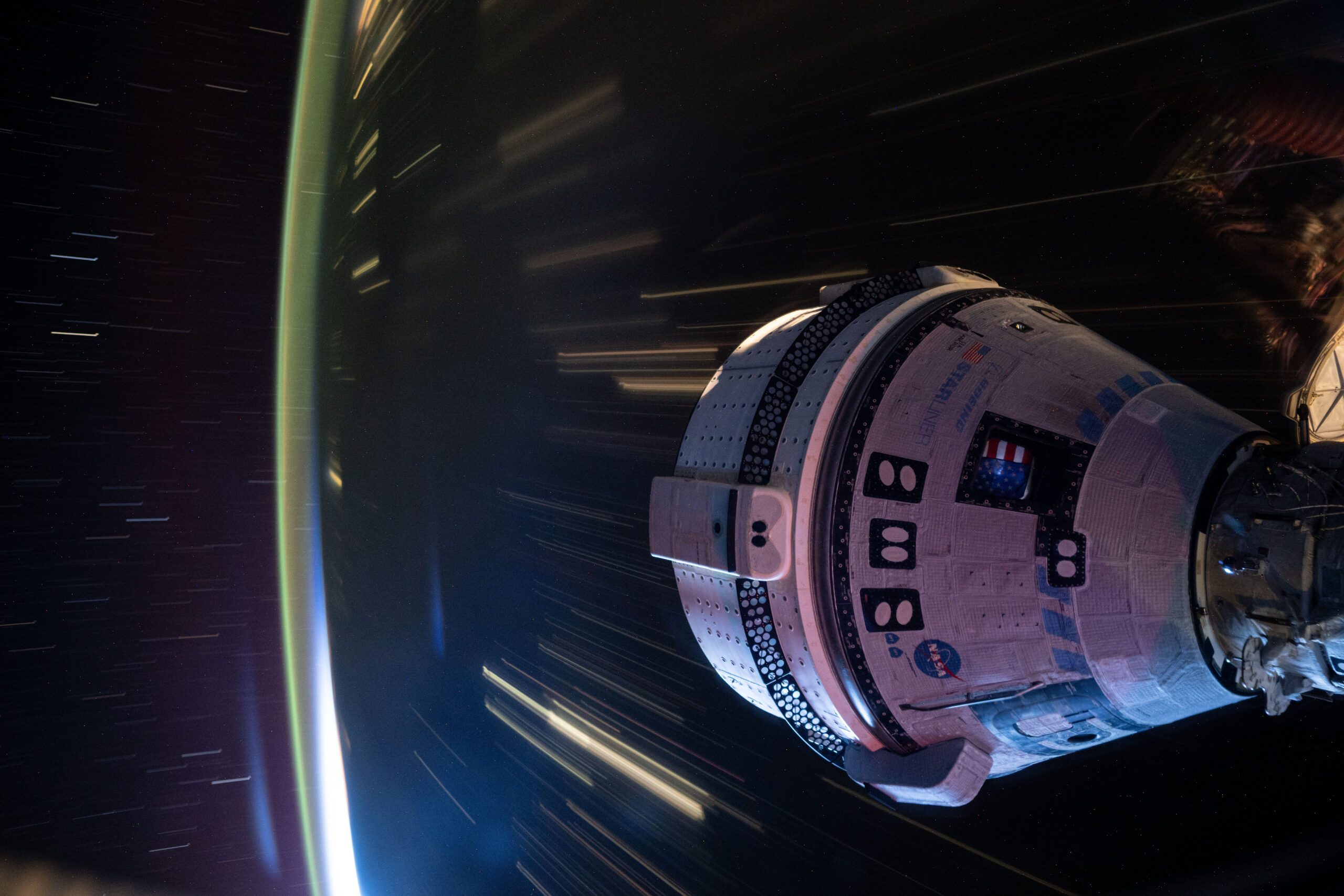 Photo credit: NASA Boeing’s Starliner spacecraft that launched NASA’s Crew Flight Test astronauts Butch Wilmore and Suni Williams to the International Space Station is pictured docked to the Harmony module’s forward port on Wednesday, July 3, 2024.